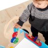 BABY EINSTEIN Hračka dřevěná aktivní vlečka Discovery Buggy HAPE 12m+