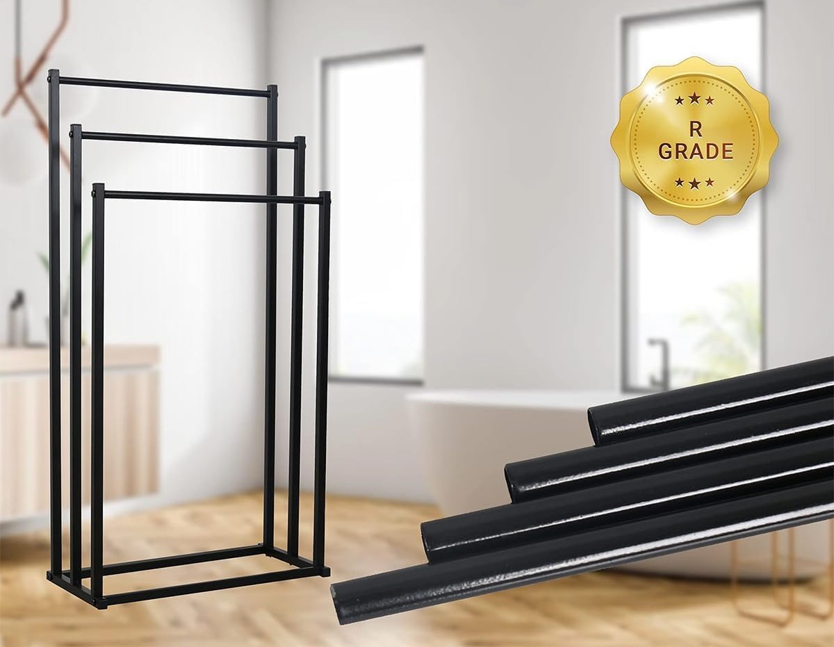 črni stojalo za brisače