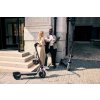 1180 3 ninebot f3 pro e d lifestyle picture couple leaning on building