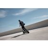 1183 11 ninebot max g3 e lifestyle picture blurry riding back shot