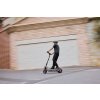 1183 4 ninebot max g3 e d lifestyle picture blurry house background riding