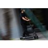 1183 6 ninebot max g3 e lifestyle picture guy riding blurry background
