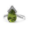 Prsten s olivínem a diamanty z bílého zlata