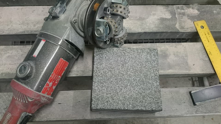 Bush-hammering in practice: How to transform an ordinary surface into a modern feature?