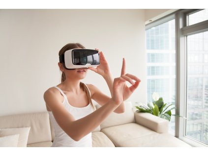 woman vr headset touching virtual objects