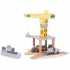 Pohyblivý přístavní jeřáb s magnetickým navijákem a doplňky  Objevte hračku, která přináší hodiny tvořivé zábavy! Tento dřevěný přístavní jeřáb s magnetickým navijákem je perfektní volbou pro malé stavitele a milovníky vlaků, lodí a techniky. Děti se díky němu přenesou do rušného přístavu, kde mohou nakládat a vykládat kontejnery, řídit pohyb vozidel a vymýšlet nekonečné herní scénáře.  Realistická zábava jako v opravdovém přístavu Hlavním prvkem sady je velký, dvoupatrový, otočný jeřáb, který se může otáčet o 360°. Je vybaven pohyblivým ramenem a silným magnetem na konci navijáku, díky kterému lze snadno zvedat dřevěné kontejnery. Děti mohou přesouvat náklad z loďí na vagony nebo kamion a zpět – přesně jako skuteční pracovníci v přístavu!  Jeřáb umožňuje pohyb nahoru–dolů i dopředu–dozadu, čímž podporuje rozvoj přesnosti a koordinace pohybů.  Bohatá sada příslušenství Součástí balení je vše potřebné pro okamžitou hru: - 1 velký, pohyblivý přístavní jeřáb s navijákem a magnetem - 1 lokomotiva - 2 vagony - 1 kamion - 1 přívěs - 1 loď – nákladní frachtovní loď pro 12 kontejnerů - 12 magnetických kontejnerů Základní deska má otvory pro koleje, takže lze sadu snadno rozšířit o další železniční prvky a vytvořit celý přístavní komplex.  Vzdělávací přínosy Tato hračka je nejen zábavná, ale také rozvíjí mnoho důležitých dovedností: - rozvíjí oko-ruka koordinaci - trénuje přesnost a trpělivost - podporuje kreativitu a prostorovou představivost - posiluje sebedůvěru dítěte - učí pečlivosti a logickému myšlení  Bezpečná a ekologická Jeřáb je vyroben z jalovcového a lipového dřeva a MDF desky. Všechny části mají hladké, zaoblené hrany a jsou natřeny netoxickými barvami. Hračka splňuje přísné evropské normy CE a EN71, takže je zcela bezpečná pro děti a zároveň šetrná k životnímu prostředí.  Specifikace: - Věk: od 3 let - Rozměry: 24 × 34 × 35 cm - Materiál: jalovcové a lipové dřevo, MDF, kov, plast - Obsah sady: jeřáb, lokomotiva, 2 vagony, kamion, přívěs, loď, 12 kontejnerů - Certifikáty: CE, EN71  Tento pohyblivý přístavní jeřáb není jen hračka – je to malý svět techniky, logistiky a fantazie, který rozvíjí dovednosti i představivost každého malého objevitele.