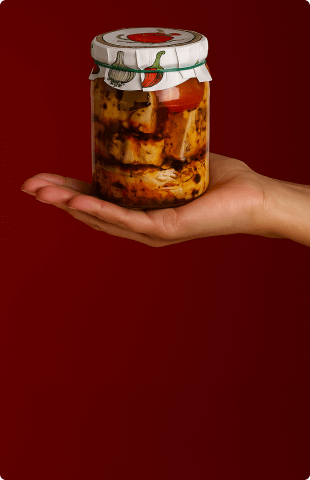 Zavařovací sklenice s nakládaným hermelínem