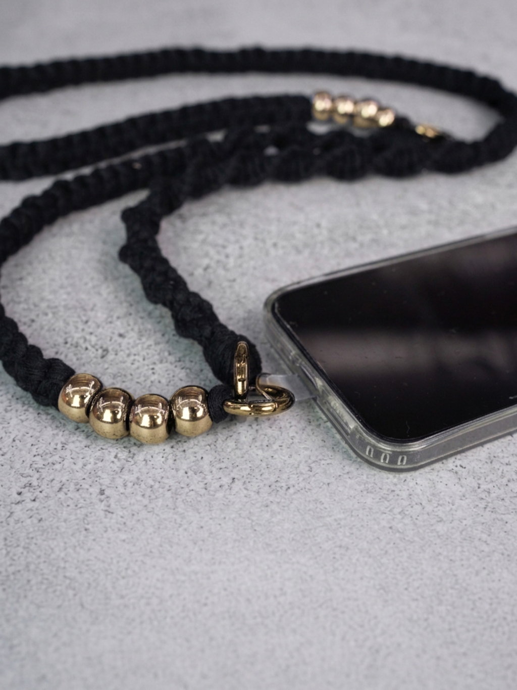 Doke popruh na telefon GOLD black