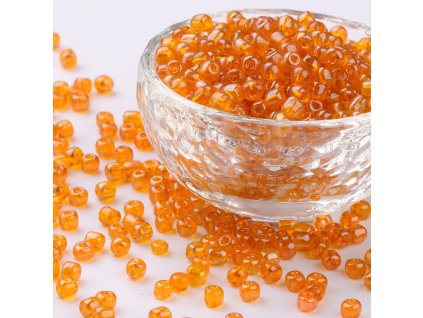 Rokajlové korálky oranžové velikost 12/0 transparentní lesklé, balení cca 12 gramů