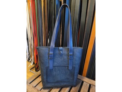 Taška modrá se zapínáním a přední kapsou