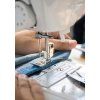 womens hand working on sewing machine picture id862120160