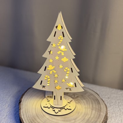 Svietiaci drevený vianočný stromček
