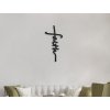 Holzkreuz mit der Aufschrift FAITH