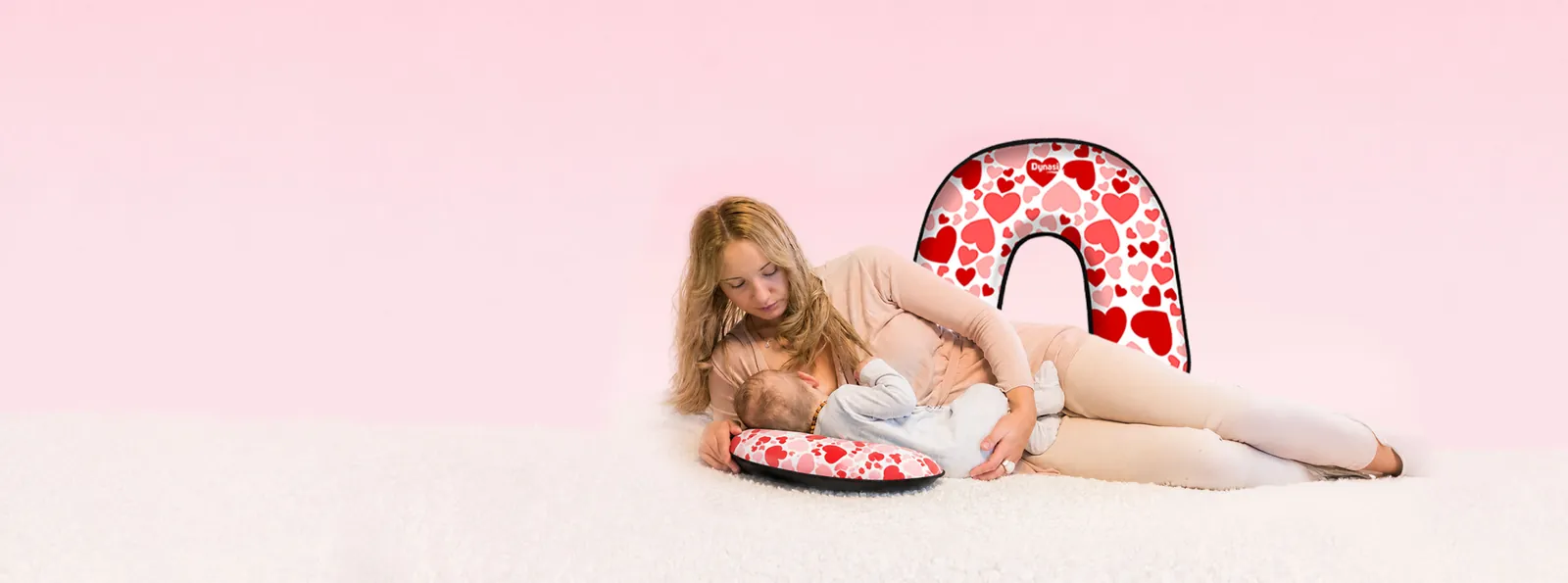 Mama s bábätkom na tehotenskom a popôrodnom vankúši Dynasit U-AIR