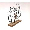 Cats couple on a wooden stand