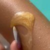 Opalovací voda SUN BRONZ s třpytivým efektem - Banana