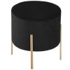 Kulatá stolička čalouněná černým sametem na jemných nohách ve zlaté barvě