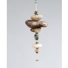 Říční závěs s africkým tyrkysem a feng shui koulí