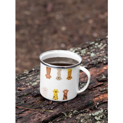 mockup of a 12 oz enamel mug with a silver rim placed on a fallen tree 30820 (3)