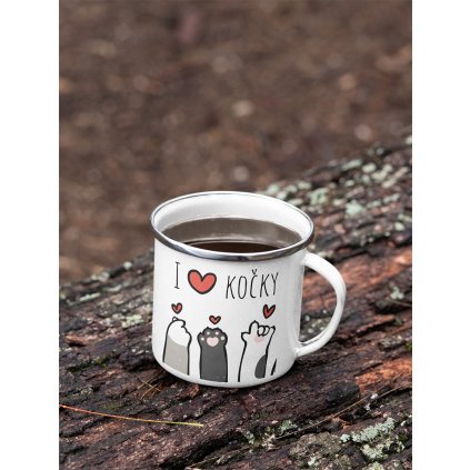 mockup of a 12 oz enamel mug with a silver rim placed on a fallen tree 30820