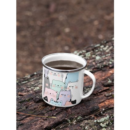 mockup of a 12 oz enamel mug with a silver rim placed on a fallen tree 30820 (4)