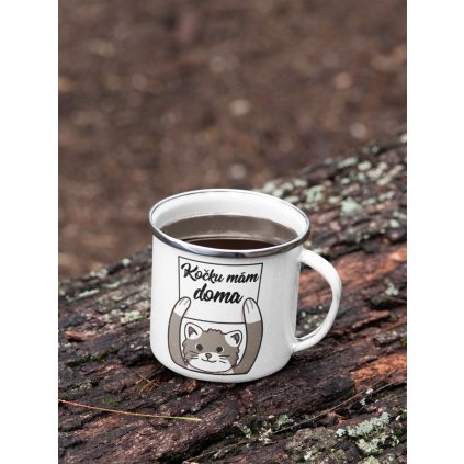 mockup of a 12 oz enamel mug with a silver rim placed on a fallen tree 30820 (13)