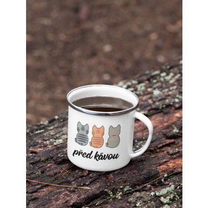 mockup of a 12 oz enamel mug with a silver rim placed on a fallen tree 30820 (10)
