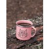 mockup of a 12 oz enamel mug with a silver rim placed on a fallen tree 30820 (1)