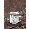 mockup of a 12 oz enamel mug with a silver rim placed on a fallen tree 30820 (8)