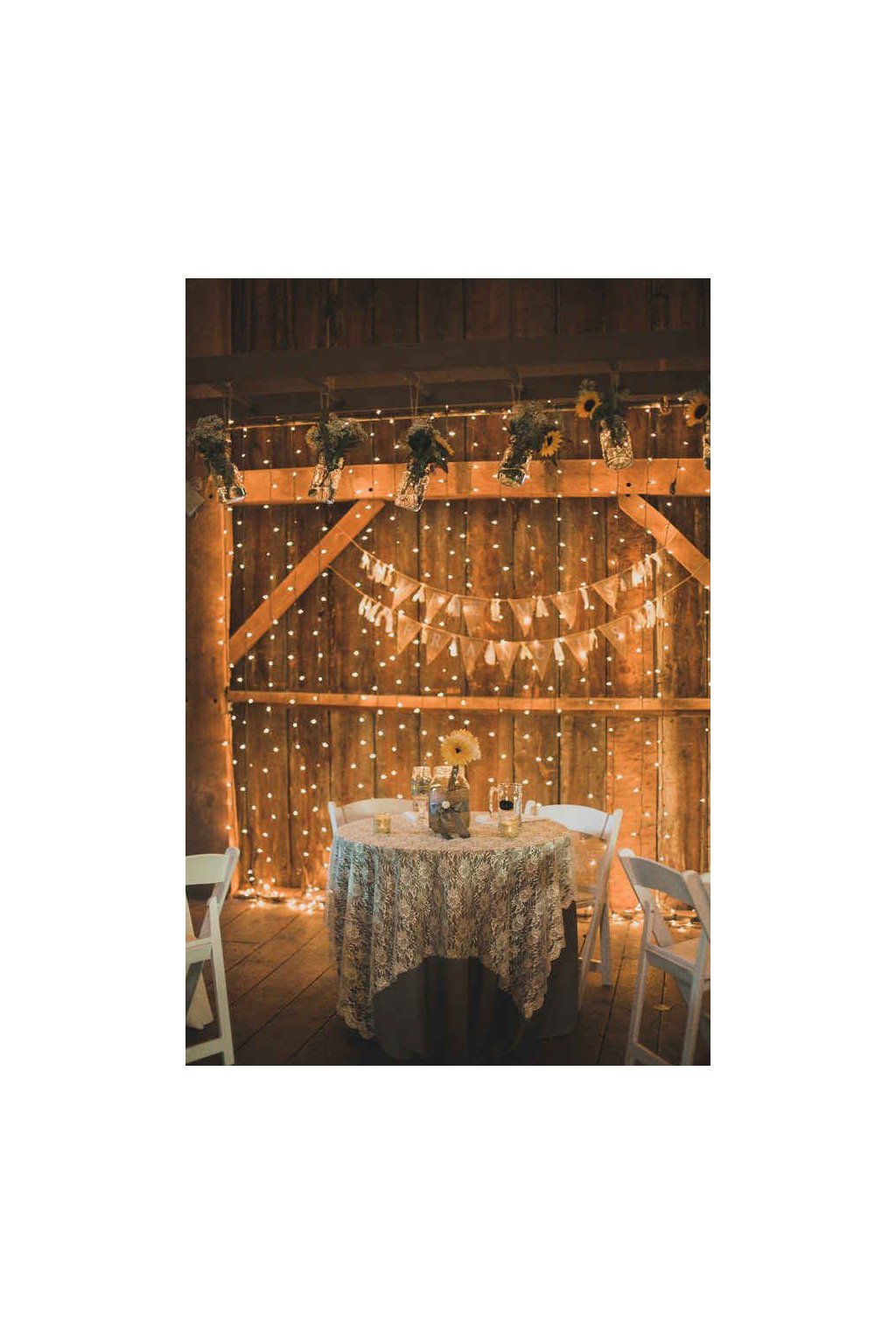 Vintage Wedding Idea Fresh sunflowers paired with twinkle light