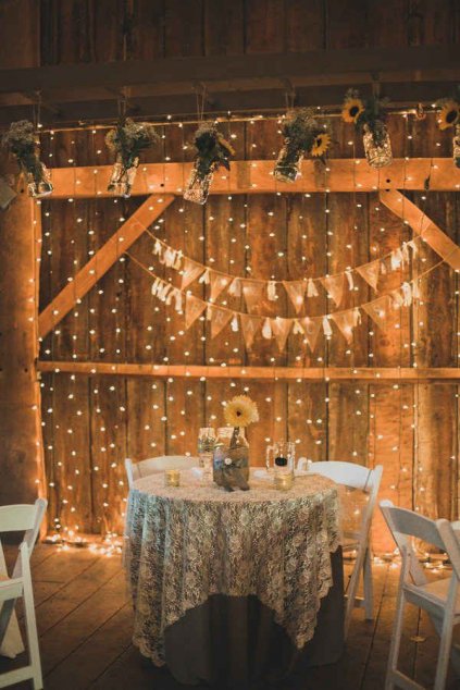 Vintage Wedding Idea Fresh sunflowers paired with twinkle light