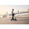 Ninebot F3 Pro E Lifestyle picture blurred background city guy