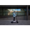 Segway ZT3 Pro Lifestyle picture City vibe Man riding side view