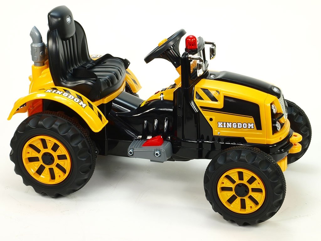 DEA elektrický traktor Kingdom s mohutnými koly a konstrukcí žlutý