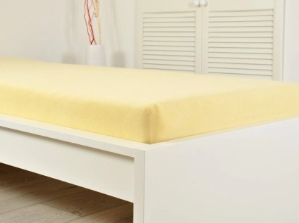 Světle žluté froté prostěradlo EXCLUSIVE 70x140 cm – měkké a pohodlné pro dětskou postýlku