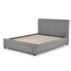 Šedá postel MODENA 180x200 cm s laťkovým roštem a úložným prostorem.