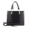 Středně velká elegantní kabelka do ruky FLORA&CO X8016 černá s kroko vzorem
