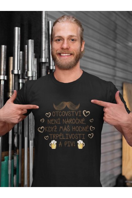 mockup of a man showing his sublimated tee in front of the bars at a gym 33056 (1)