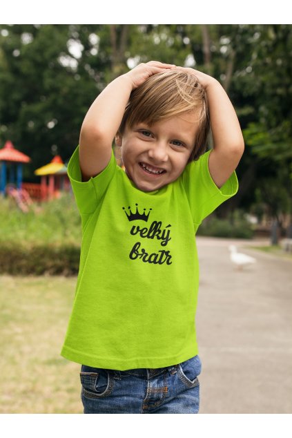 boy wearing a t shirt mockup while at a park with ducks a17942 (1)