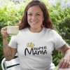 mockup of a happy middle aged woman wearing a t shirt while having a coffee in the backyard a16192