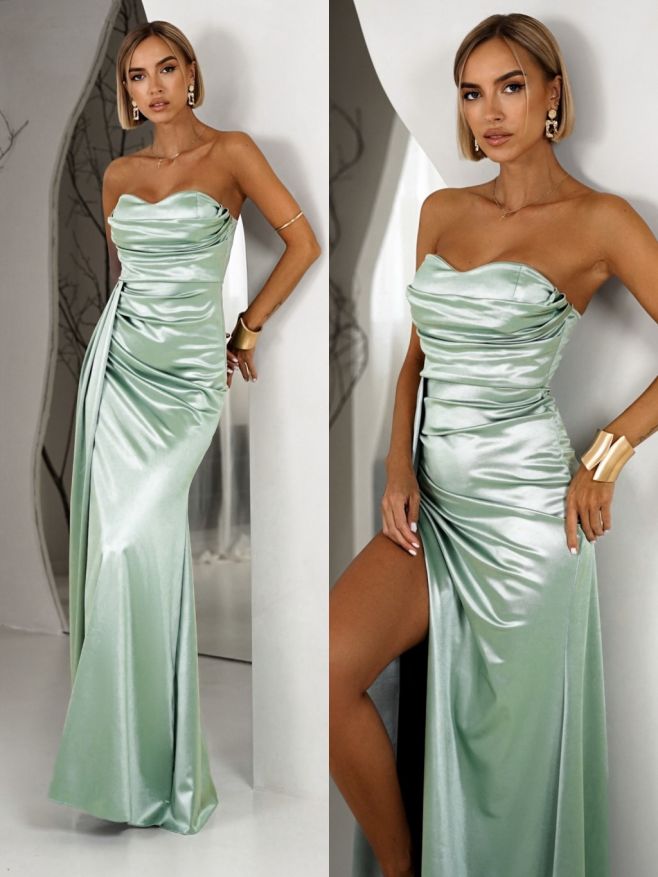 Dlouhé korzetové společenské šaty, které udělají postavu snů. Saténový lesk, rafinované řasení a vysoký rozparek =...