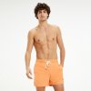 Tommy Hilfiger pánské plavky slim fit - střední délka nohavic - Oranžové (UM0UM01080_617 melon - medium DRAWSTRING SLIM FIT SWIM SHORTS)