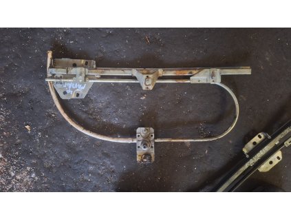 Stahovačka mechanismus stahování okna levý přední Škoda Favorit