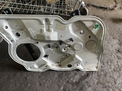 Stahovačka leva přední Škoda Octavia 2