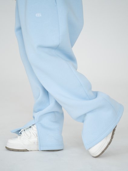 Unisex rozšířené tepláky s rozparkem Baby blue