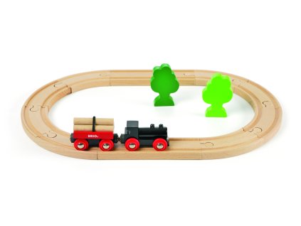 Malá vláčkodráha s vláčkem a vagónkem s kládami