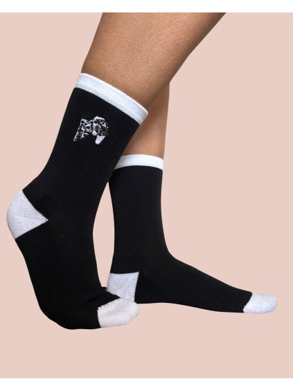 black sock with dalmata dog