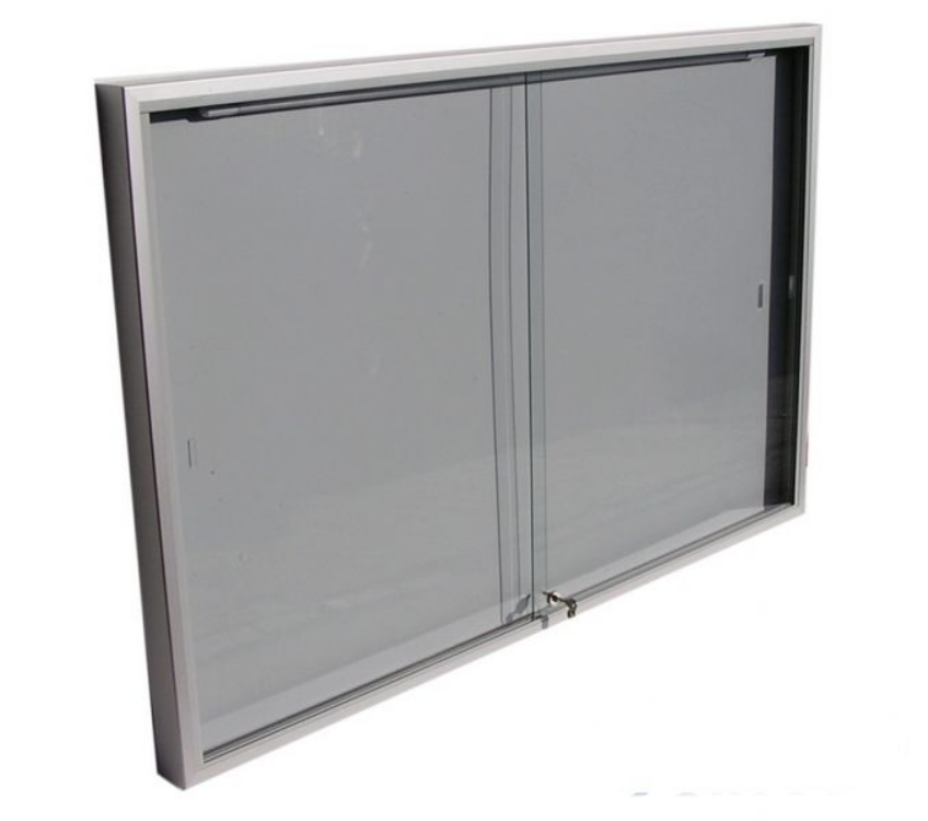 EXPOINT Závěsná vitrína s úzkým profilem s posuvnými skly Název: Formát 12xA4, rozměr: šířka 1000 x 1040 x 69mm