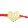 Zlaté SRDIEČKO na červenej šnúrke.