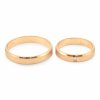 Svadobné obrúčky z červeného zlata mierne polgulaté široké 4.4 mm s jedným zirkónom